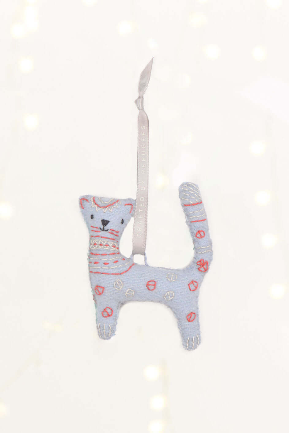 Weihnachtsschmuck "Snow Leopard" vom Projekt MADE51 (UNHCR)